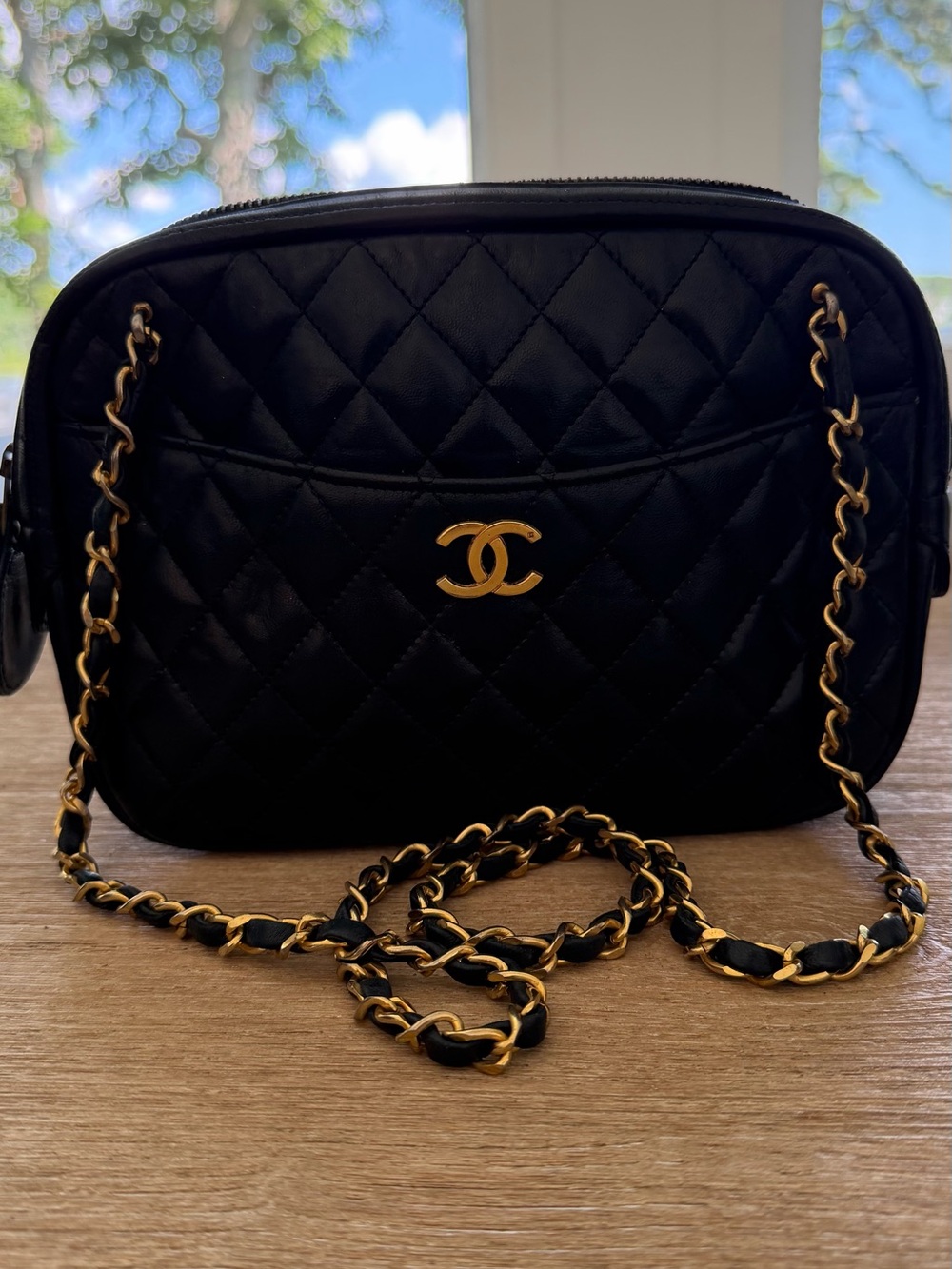 CHANEL Black Quilted Crossbody Bag with Gold Hardware